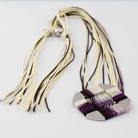 IKAT technique inspired woven pendant